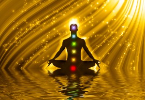 meditating person with chakras